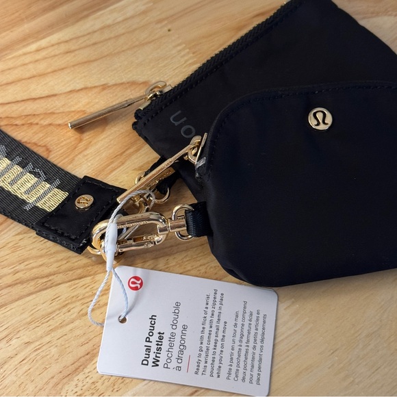 NWT Lululemon Dual Pouch Wristlet Black Gold Wordmark NWT - Picture 5 of 7